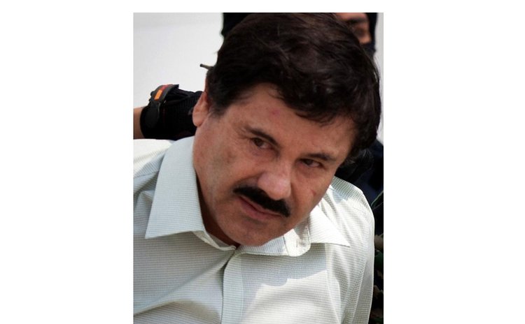 Picture taken on Feb. 22, 2014 shows Mexican drug cartel kingpin Joaquin 'El Chapo' Guzman being presented before media at a navy hangar in Mexico City. 