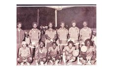 Trevor Knight (standing, 2nd from Right) and Emanuel Loblack (stooping, far Right) on 1976 National Basketball Team, 2nd Windwards Basketball Tournament