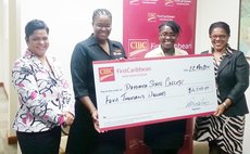First Caribbean Bank officials present cheque to Dominica State College