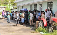 Farmers gather at Division of Agriculture, Roseau for World Bank Grant