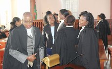 Mary Roberts , president of the Dominica Bar Association, and other female lawyers at the High Court