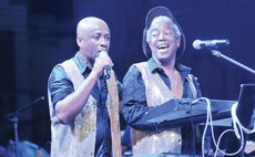 Fitzroy Williams, right, and Gordon Henderson performs at the Papa Creole show