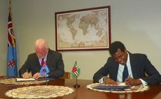 Henderson, rt, sign on behalf of Dominica