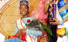 Miss Dominica Francine Baron after she was crowned at the Windsor Park Stadium on Saturday morning