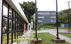 Gas prices at September 15, 2015: Sign at NP gas station in Canefield