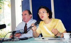 Grace Tung, left, and Pinard-Byrne at a press conference during the construction phase of the Layou River Hotel