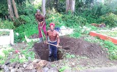 Gravediggers at the Roseau Cemetary