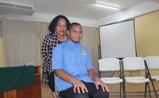 Top local CXC student Hananel Valarie and his mom