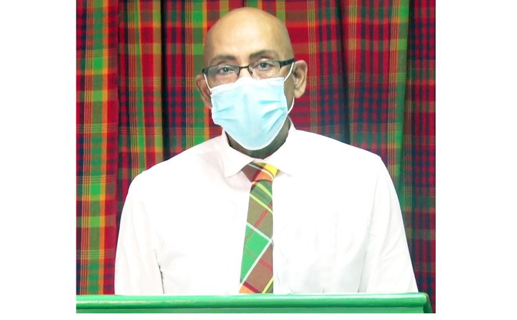 Health minister McIntyre wears COVID mask