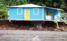 House built on the bank of a river