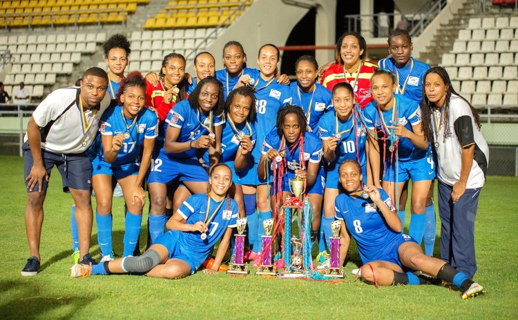 Martinique team pose after the tournament at the Windsor Park Sports Stadium