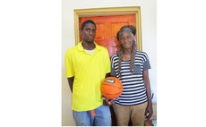 Athlene Magloire with son Tilon Birmingham. Missing "basketball children" are Ahlai-Anna, Kirby and Maxwell