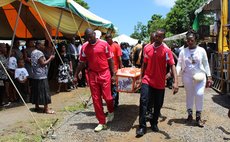 Carrying "Blink's" coffin to the funeral