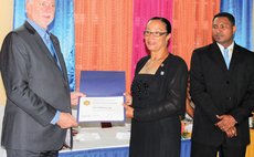 International Rotary President delivers certificate