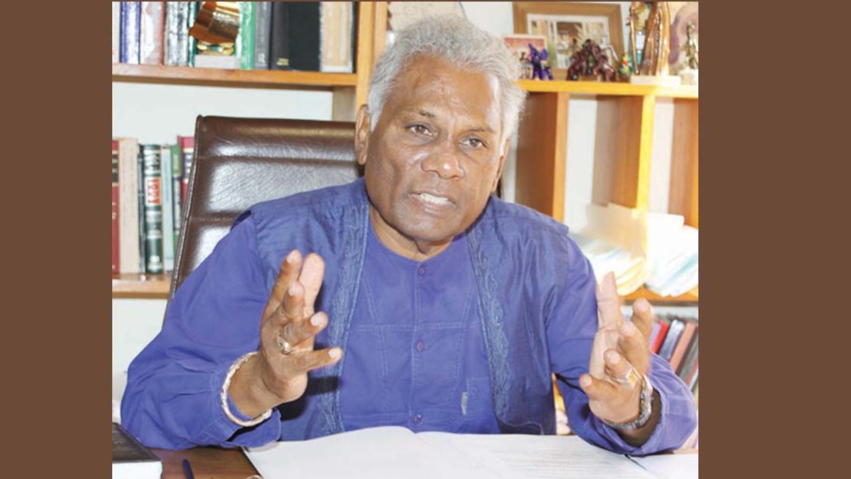 Israel Khan at his office ( Photo courtesy Trinidad Guardian) Israel Khan at his office ( Photo courtesy Trinidad Guardian)