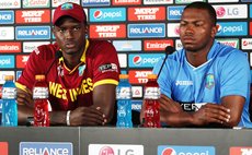 Jason Holder and Johnson Charles at the post-match press conference