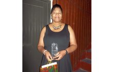 Jermaine Jean-Pierre shows her awards