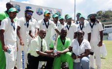 Judge Bernie Stephenson poses with the Guyana team