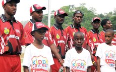 Young cricketers and members of the Dominican team