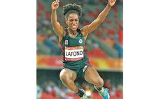 In flight: Long Jumper LaFond at the Commonwealth Games