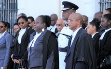 Judge Stephenson, centre front; Registrar Ossie Walsh,right front, Police Commissioner Carbon and members of the Dominica Bar
