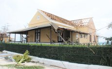 With roof blown away, the Roseau Library after Hurricane Maria