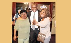 Opposition Leader Lennox Linton, poses with members of the Dominica Diaspora