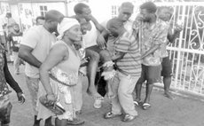 People help injured protesting bus driver