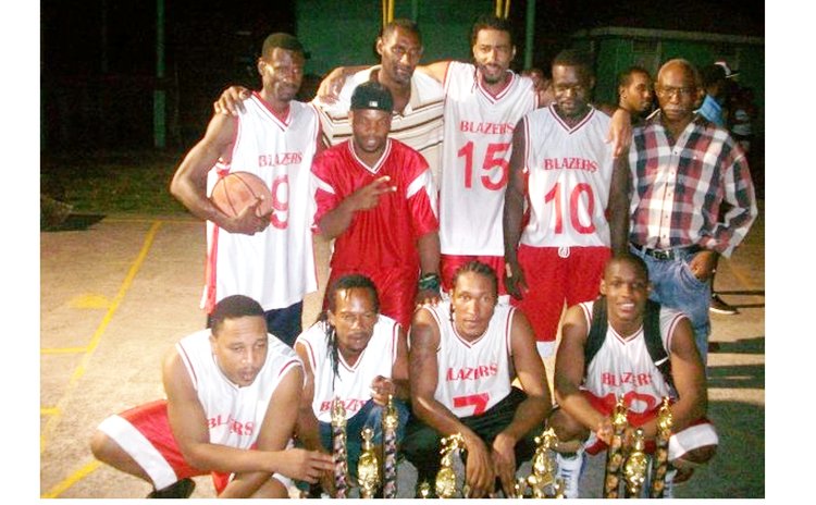 BLAZERS on winning the 2009 Premier Division championship, accompanied by Coach (in long-sleeved shirt)