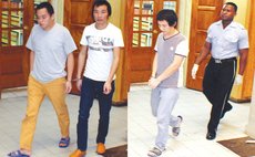 After sentencing, men are taken to jail