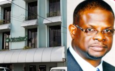 National Bank of Dominica headquarters and Anthony John , NBD chairman