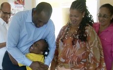 Prime Minister Skerrit greets members of the Alpha Centre