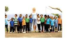 Petra Charles with children of the Kalinago Territory