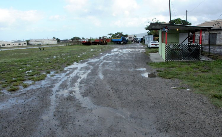 Photograph of Canefield playing field and dirt road