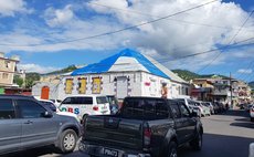 Piper Step on Independence Street, Roseau still covered by taupaulin