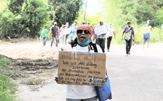 Protester on walk to Skerrit residence at Morne Daniel