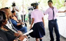 Pupils of the Newtown Primary School dance at school building contract signing ceremony