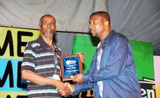In 2011 the Dominica Calypso Association honored Randy Aaron ,left, for long and dedicated service to the art form