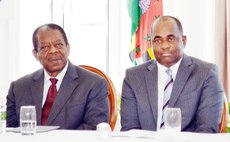 FILE PHOTO: Sir Dennis Byron and Prime Minister Roosevelt Skerrit at a CCJ function in 2015 