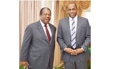 Former CCJ president Sir Denis Byron and Prime Minister Skerrit in 2015