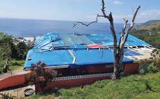 House at upper Canefield damaged by Hurricane Maria