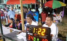 Table Officials with mini electronic scoreboard at national league game, Lindo Park, 2014.  Photo courtesy DABA Facebook Page