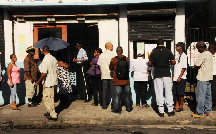 Dominicans vote in Roseau during the 2014 general election