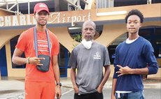 Washway Douglas (Centre) with Jacob Barry and Jarquan Hamilto of the OO Washers Programme