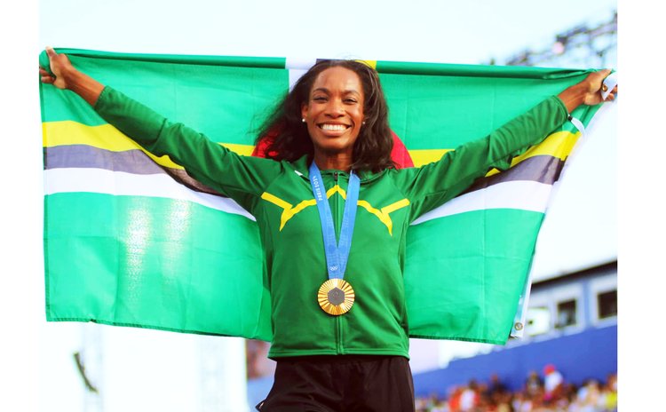 Thea with Dominica's flag 