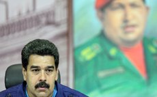 CARACAS, Feb. 22, 2014 (Xinhua) -- Venezuelan President Nicolas Maduro attends a press conference at Miraflores Palace, in Caracas, capital of Venezuela, on Feb. 21, 2014. 