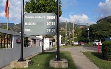 Sign outside the NP gas station in Canefield showing February 2016 gas prices
